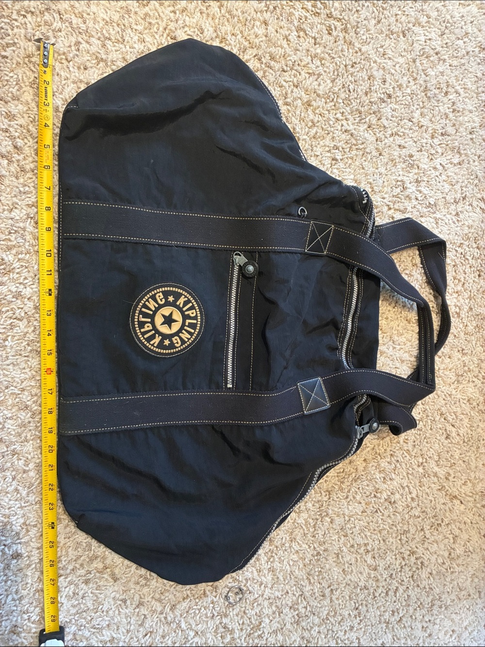 Kipling Black Duffel with Tan Logo Patch and Contrast Stitching